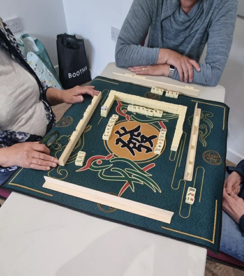 A game of Mahjong about to start